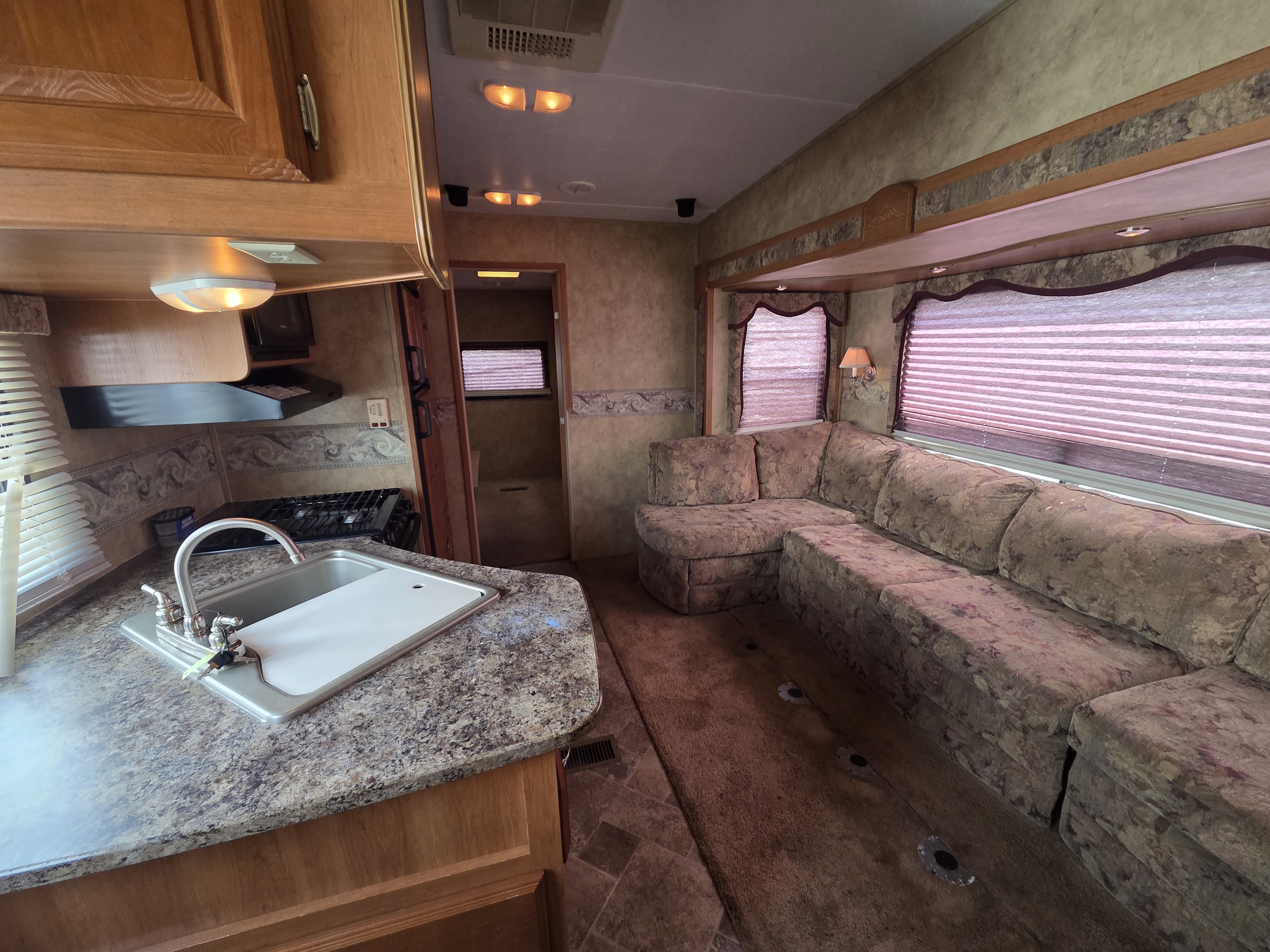 2009 Keystone Cougar 316QBS, $ 12,700