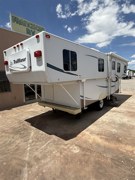 2009 TrailManor 2720, $ 7,999
