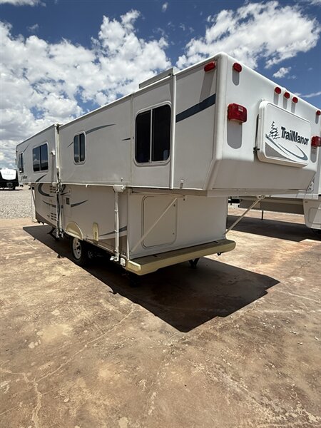 2009 TrailManor 2720, $ 7,999