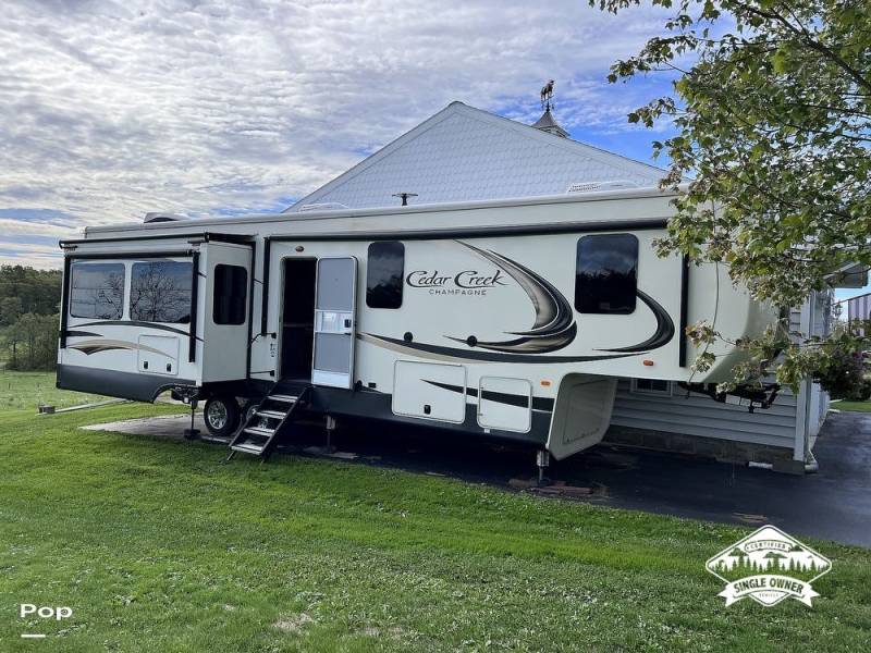 2019 Forest River Cedar Creek 38 EL - Champagne Ed, $ 55,000