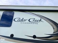 2019 Forest River Cedar Creek 38 EL - Champagne Ed, $ 55,000