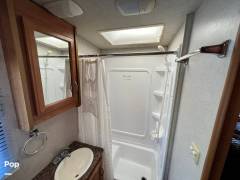 2010 Fleetwood Quest 24E, $ 55,000