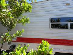2002 Forest River Sandpiper T25 Toy Hauler, $ 12,000