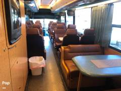 2000 Custom Conversion 4500 MCI 102, $ 55,000