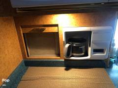 2000 Custom Conversion 4500 MCI 102, $ 55,000