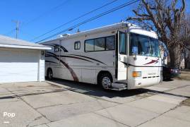 1999 Country Coach Intrigue 36' Slide, $ 38,900