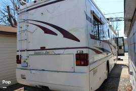 1999 Country Coach Intrigue 36' Slide, $ 38,900
