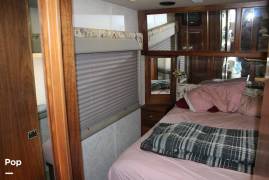1999 Country Coach Intrigue 36' Slide, $ 38,900