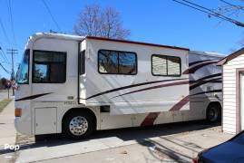 1999 Country Coach Intrigue 36' Slide, $ 38,900