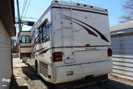 1999 Country Coach Intrigue 36' Slide, $ 38,900
