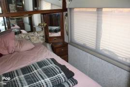 1999 Country Coach Intrigue 36' Slide, $ 38,900