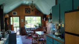 1999 Custom Built Houseboat, $ 109,900.00