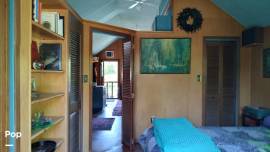 1999 Custom Built Houseboat, $ 109,900.00
