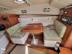 1999 Pursuit 3000 Express, $ 69,000.00