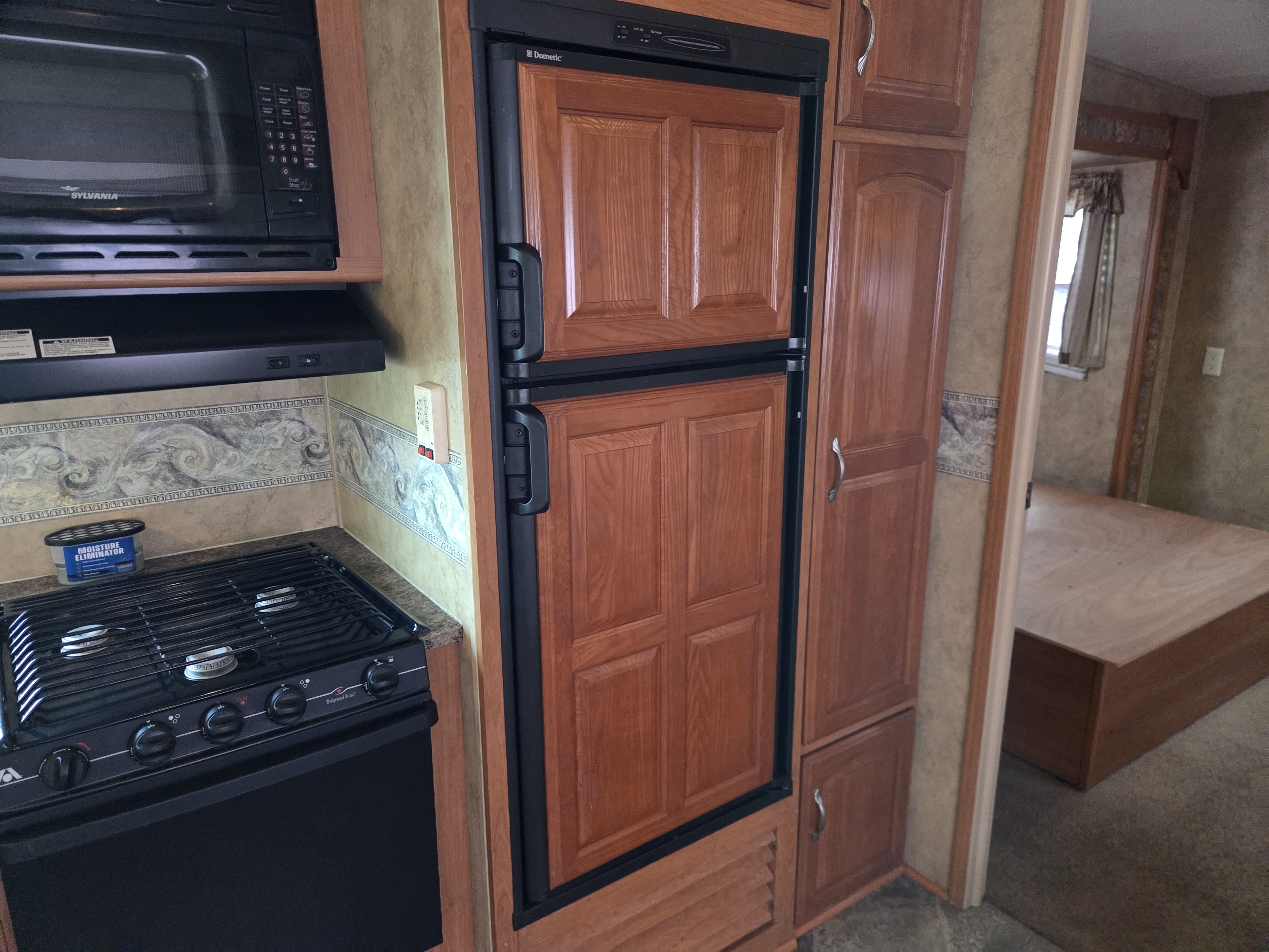 2009 Keystone Cougar 316QBS, $ 10,495