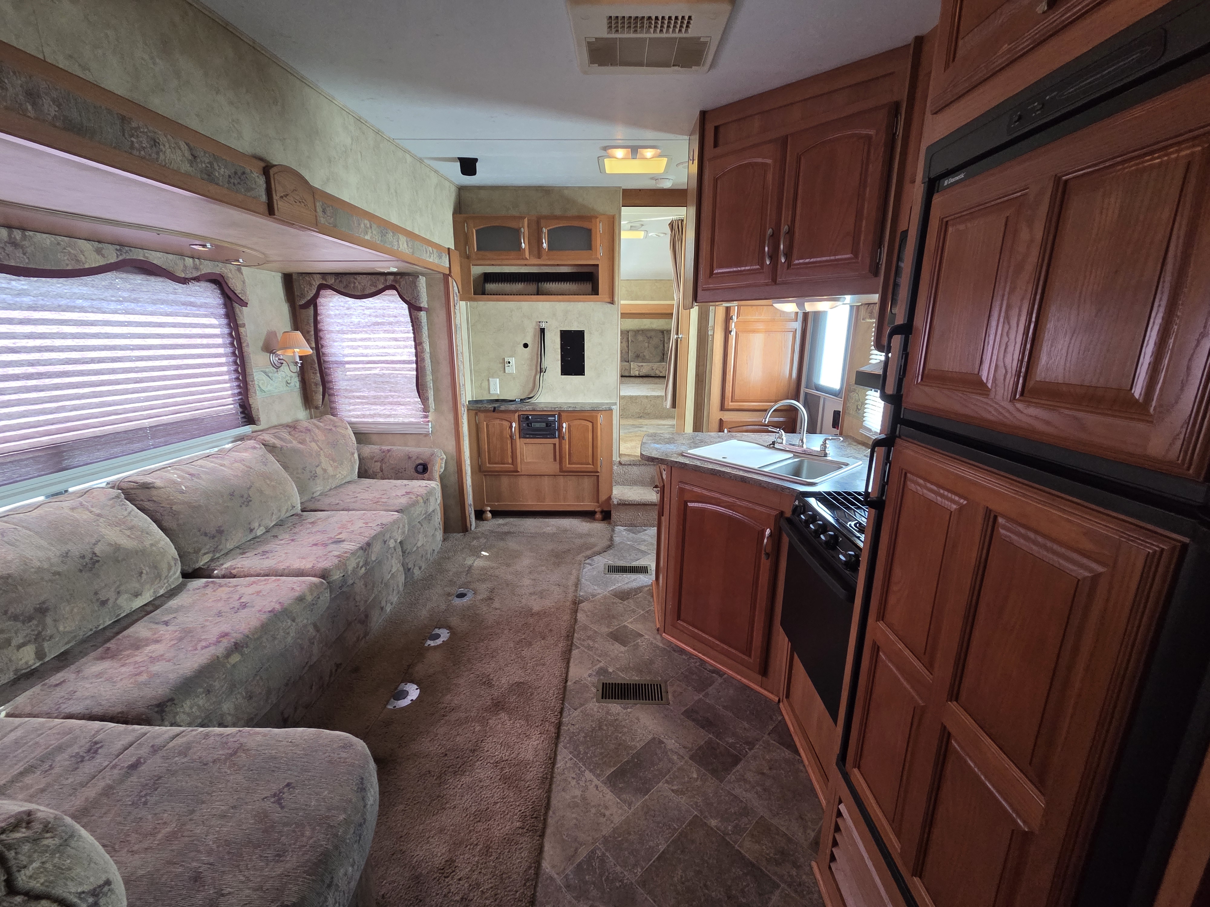 2009 Keystone Cougar 316QBS, $ 10,495