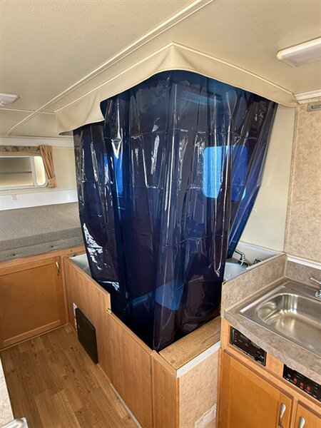 2009 TrailManor 2720, $ 7,999